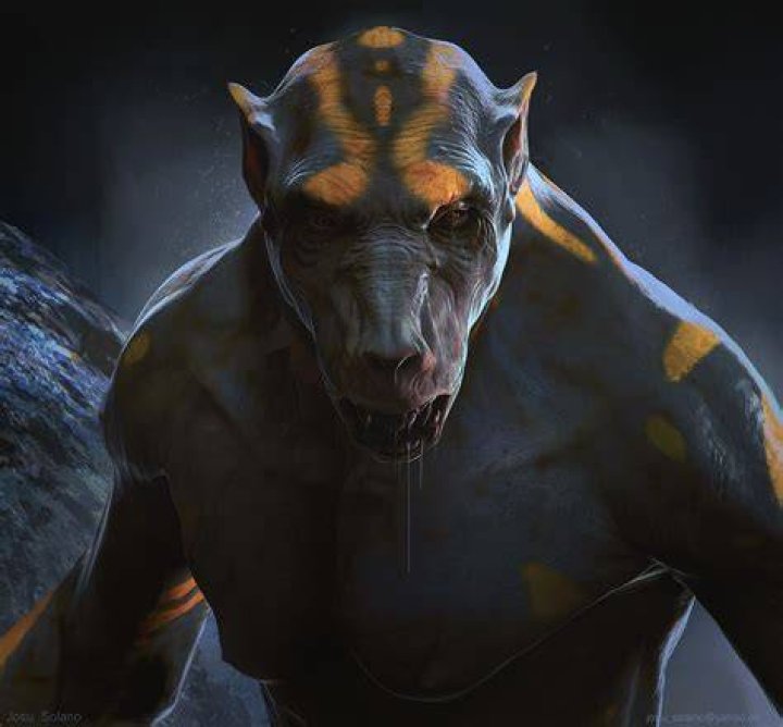 A humanoid cat-like creature looks angry as it stands under a light.