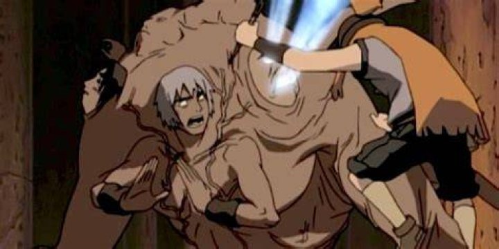 A transformed Arashi is stopped from attacking by Sasame in Naruto.