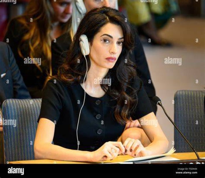 Amal Clooney's Sister, Tala Alamuddin, in a Red OneLeg Jumpsuit at