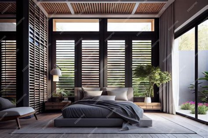 Bedroom with floor-to-ceiling window