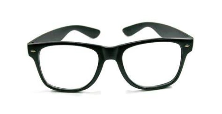 black framed glasses on pile of study papers