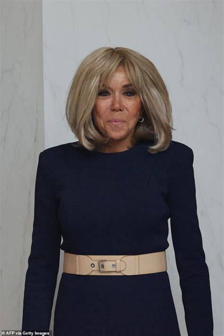 Brigitte Macron looks glamorous at state dinner at the Elysee Palace
