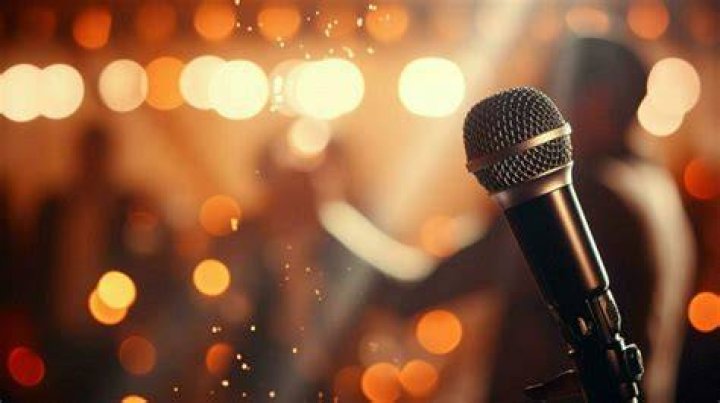 David singing at open mic night in Schitt's Creek
