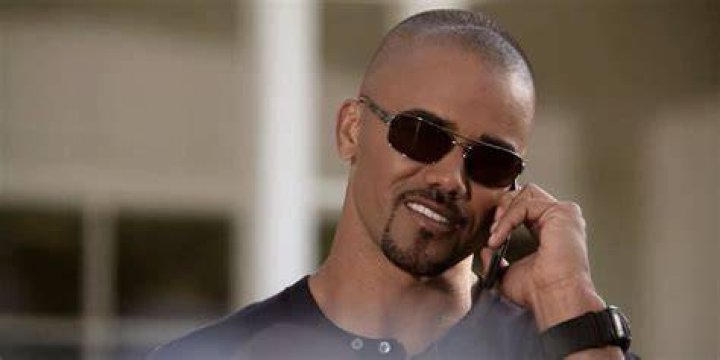 Derek talking on the phone in Grey's Anatomy 