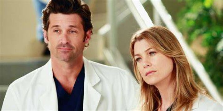 Derek talking to Meredith at the beach in Grey's Anatomy 