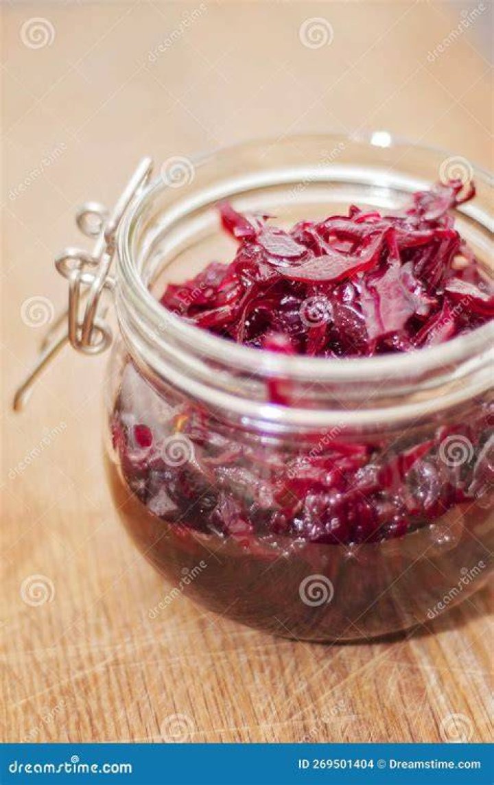 Fermented vegetables. Sauerkraut with carrots and cucumbers. fermented vegetables homemade marinated cabbage with carrot and cucumbers, sauerkraut sour in glass jars preserved canned vegetables, superfoods and vegetarian food