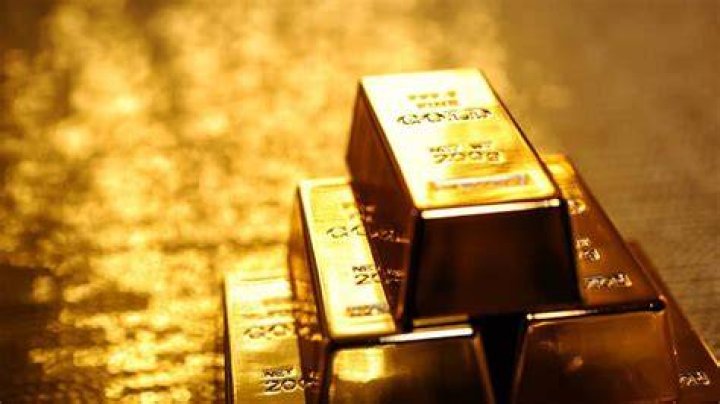 Gold settles at onemonth high amid US stimulus hopes
