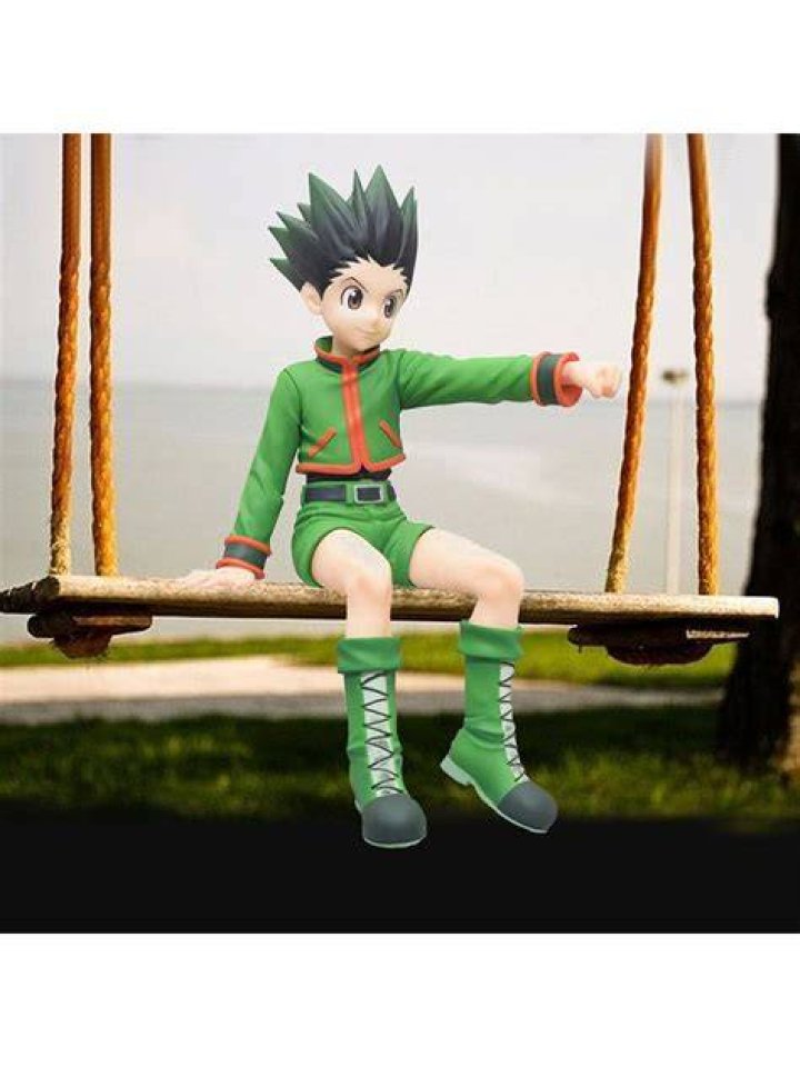 Gon Freecss sitting next to a young girl