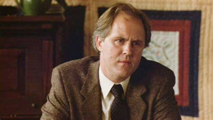 John Lithgow Looking Serious on a Farm in Interstellar