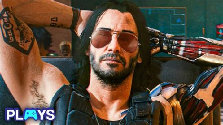 Johnny Silverhand adjusts his sunglasses in front of Cyberpunk 2077's base stat tree.