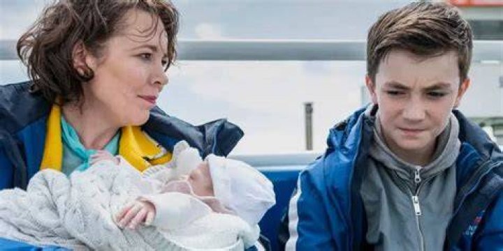 Joy and Mully talking on a boat