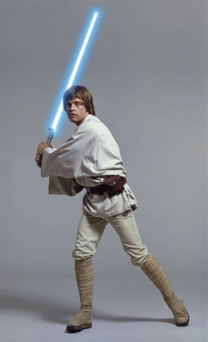 Luke Skywalker walking into a sunset