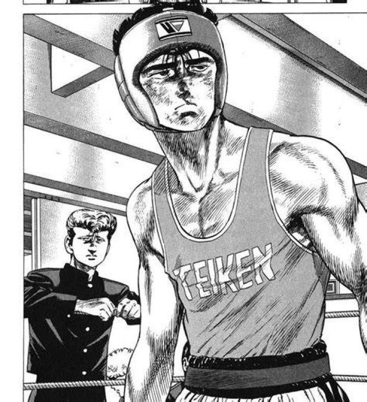 Maeda Taison angrily cracking his knuckles, startling his friend, in Rokudenashi Blues.