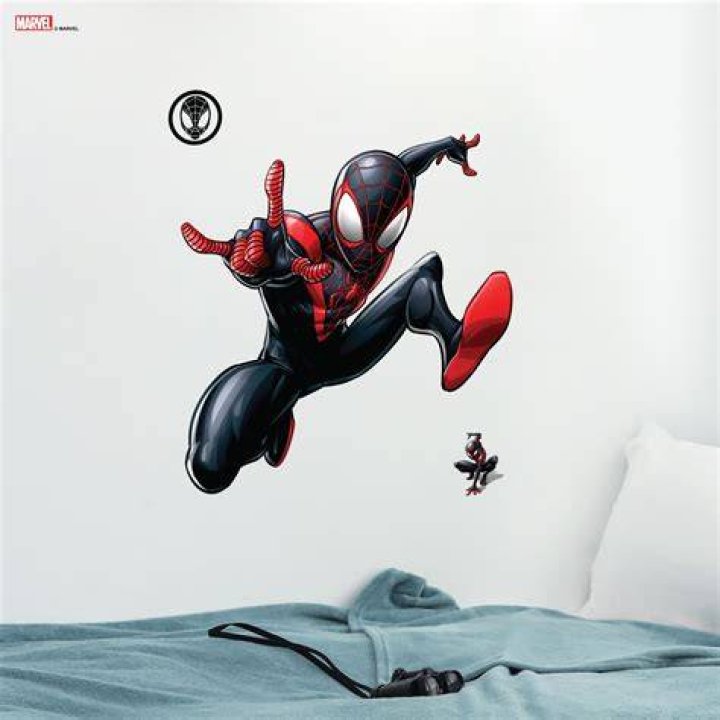 Miles Morales wall crawls in Into The Spider-Verse