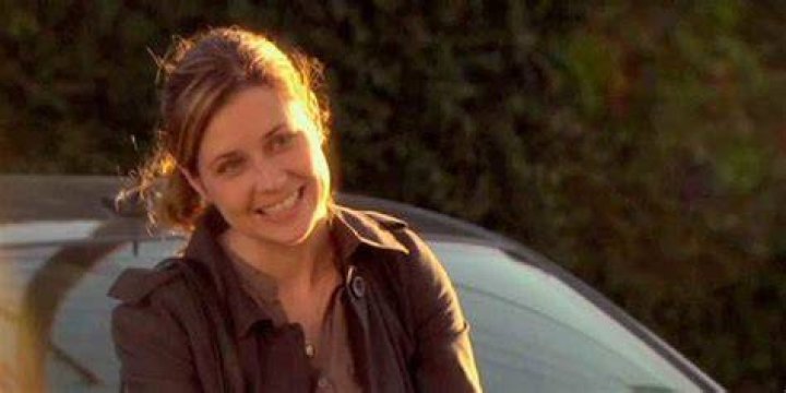 Pam standing in the parking lot on The Office