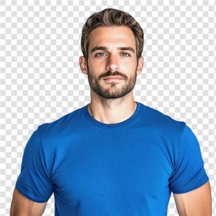 person in blue shirt with blue and red backpack across shoulders
