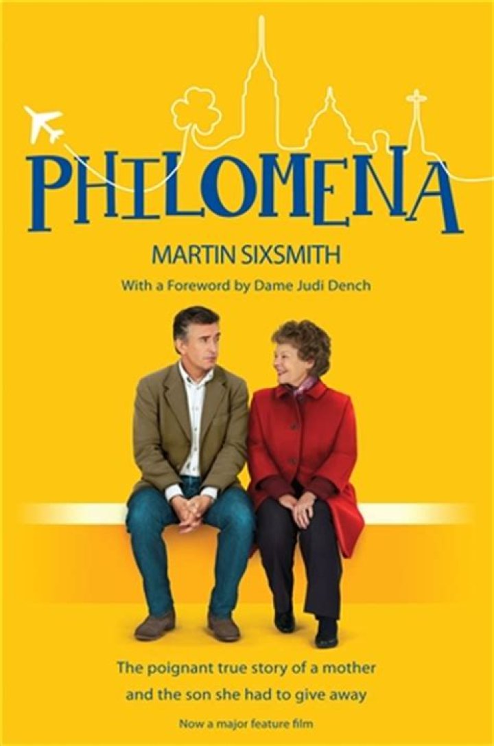 Philomena and Martin looking down while in the snow in Philomena