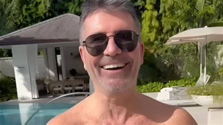 Simon Cowell shows off his toned physique as he goes on a jet ski with