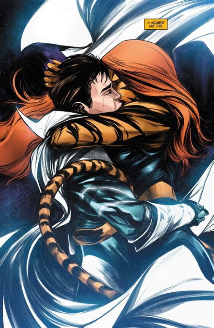 Tigra trying to take Moon Knight's mask in the comics