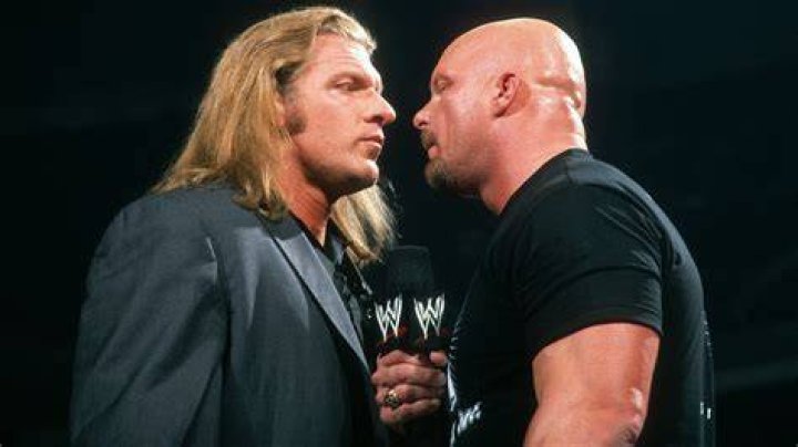 Triple H attacking Stone Cold Steve Austin in WWE