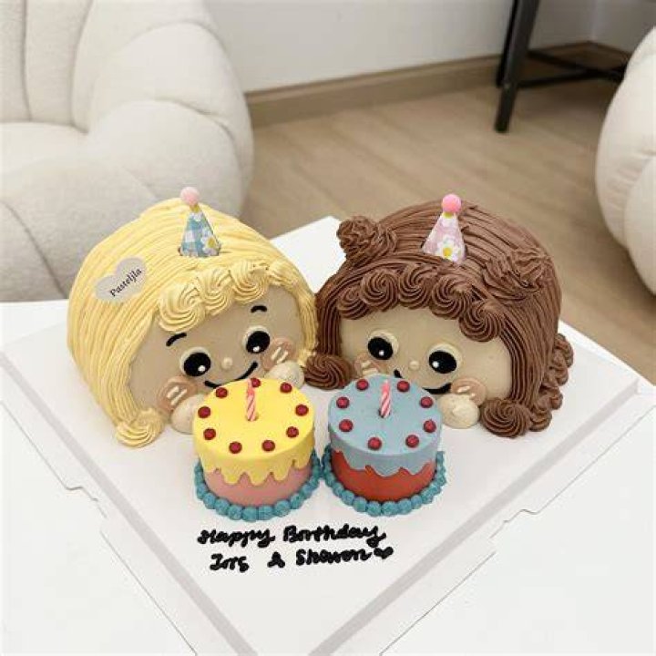 two girls with cake
