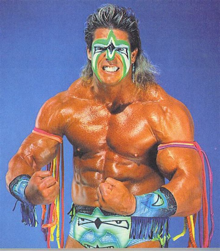 Ultimate Warrior going for a pin after hitting his Warrior Splash.