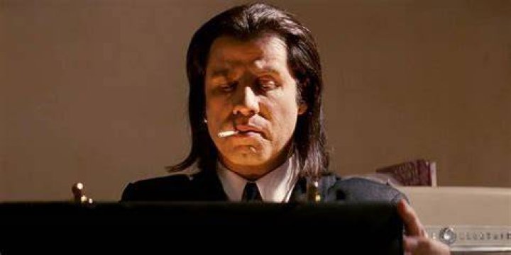 Vincent looks in the briefcase in Pulp Fiction