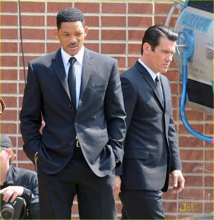 Will Smith, Josh Brolin, and Tommy Lee Jones on the poster for Men in Black 3